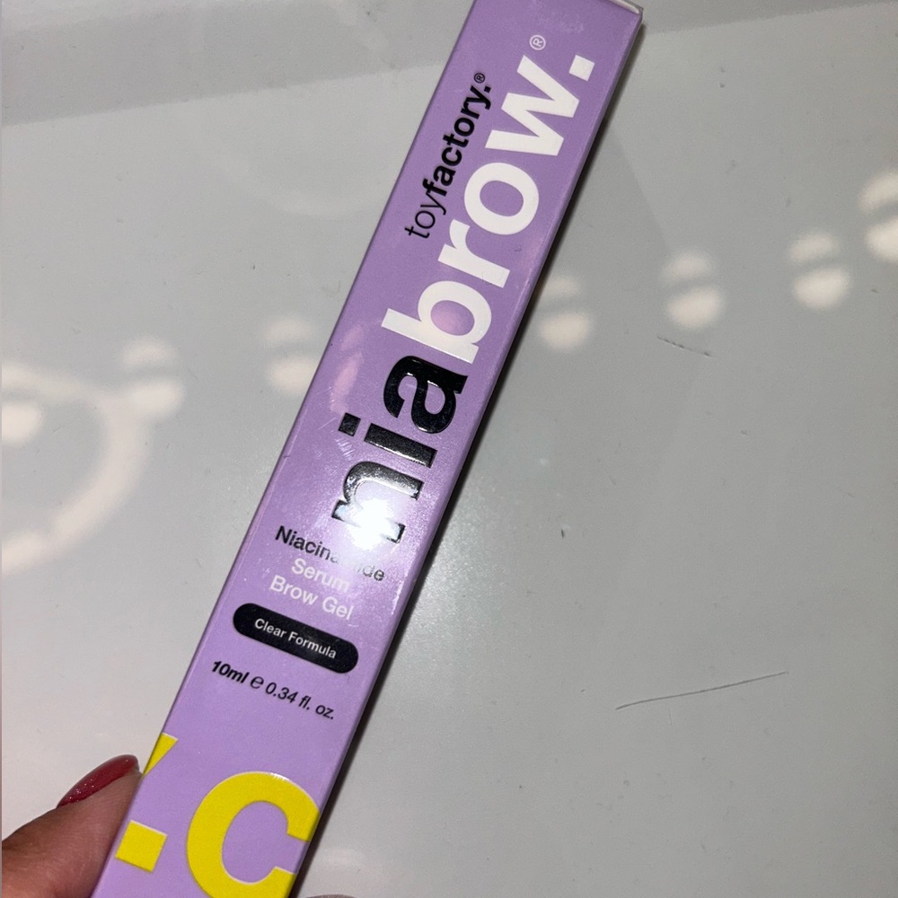 Toy Factory Nia brow Brow Gel - Clear Formula in Lavender Packaging
